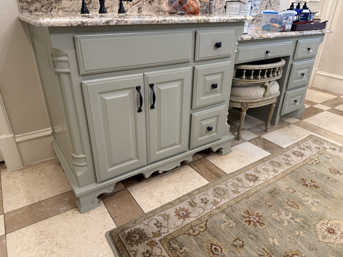 Same vanity cabinets refinished in sage green
