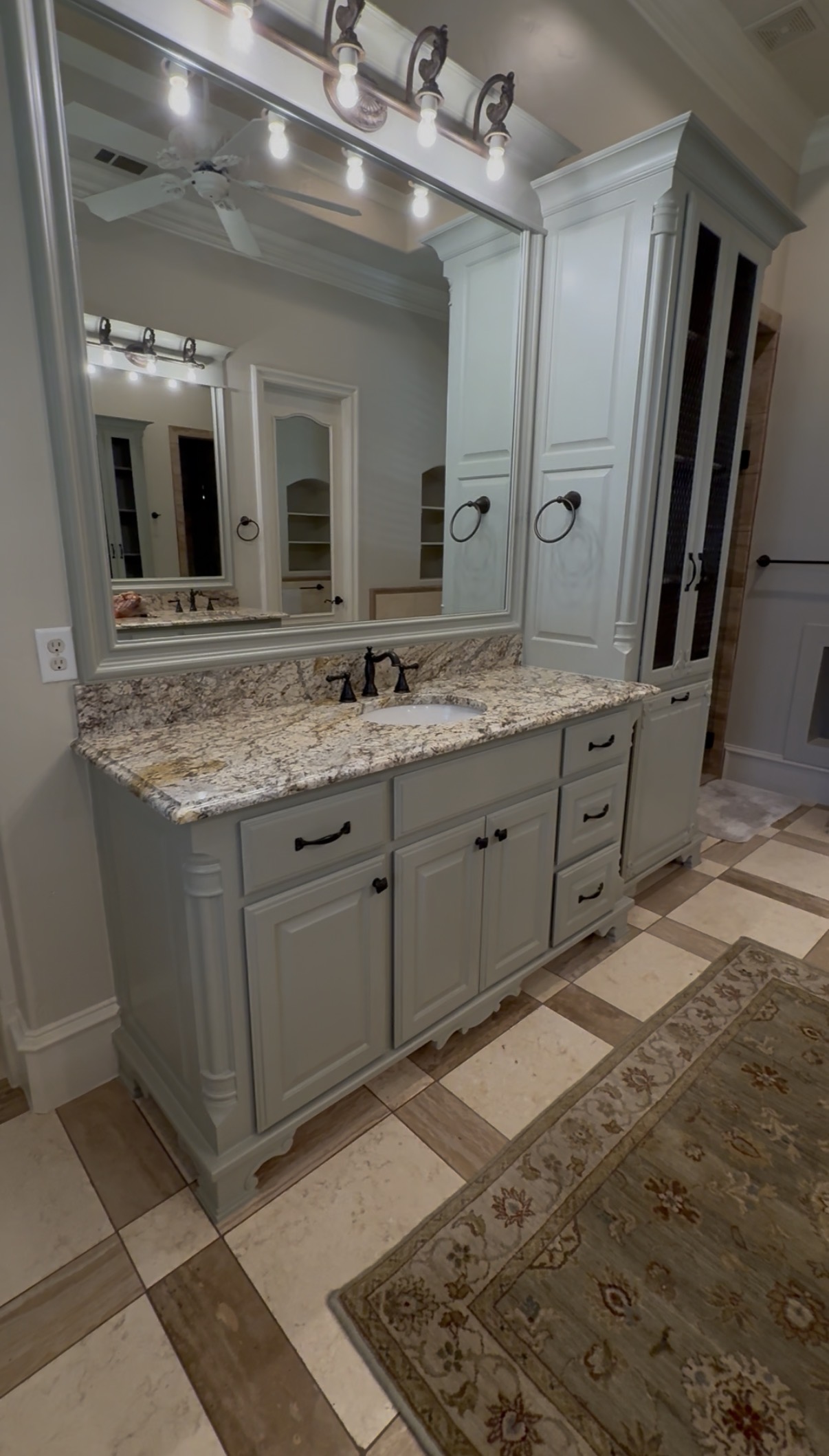 Master bath cabinets refinished in sage green